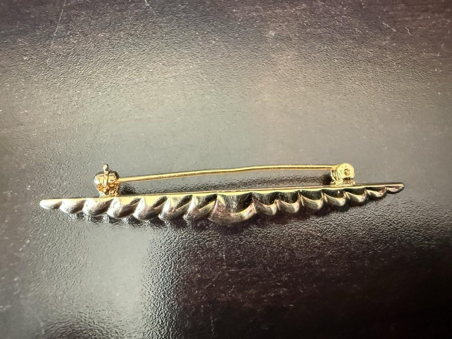 Monet brooch, signed Monet, gold tone Scalloped with tapered ends, 1980’s