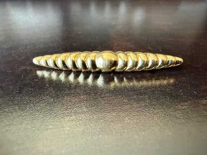 Monet brooch, signed Monet, gold tone Scalloped with tapered ends, 1980’s