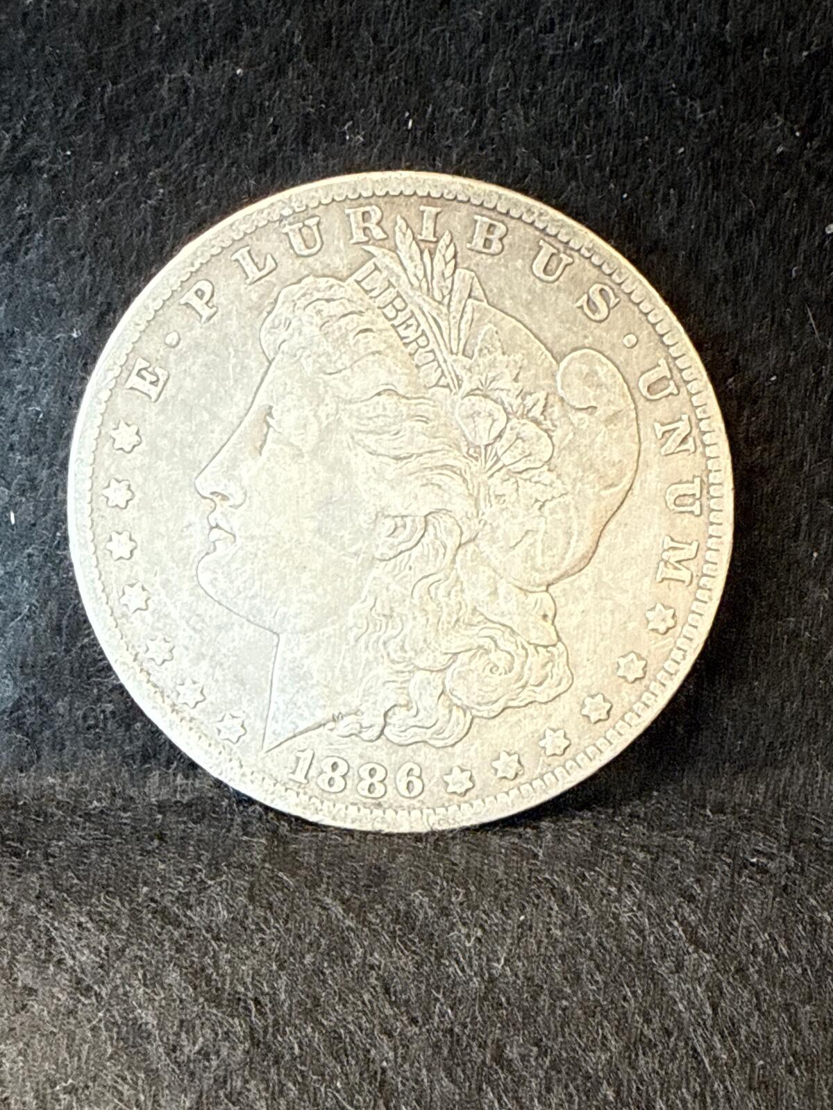 1886-O USA Morgan Dollar - .900 silver UC26030066
