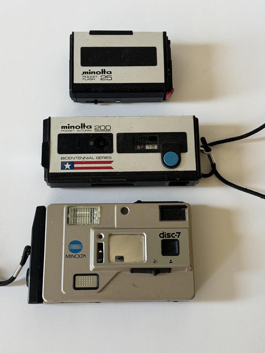 Vintage Minolta Camera Lot Disc-7 Pocket Autopak 200 Bicentennial Untested